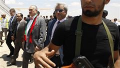 Foreign Minister Karel Schwarzenberg (wearing a scarf comprised of the Libyan national colors) arrives on a fact finding and humanitarian mission to the rebels Foreign Minister Karel Schwarzenberg (wearing a scarf comprised of the Libyan national colors) arrives on a fact finding and humanitarian mission to the rebels
