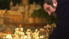 A man inspects the details of carved wooden figures in a Czech nativity scene from the late 19th century. A Czech subculture still produces and exhibits ‘betlémy’ in a bewildering array of styles and materials (from carved fish to gingerbread) A man inspects the details of carved wooden figures in a Czech nativity scene from the late 19th century. A Czech subculture still produces and exhibits ‘betlémy’ in a bewildering array of styles and materials (from carved fish to gingerbread)