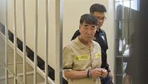 Kapitán ztroskotaného trajektu Sewol I Čun-sok v doprovodu policejní eskorty. | na serveru Lidovky.cz | aktuální zprávy