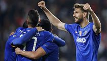 Fotbalist Juventusu se raduj z postupu do semifinle Ligy mistr.