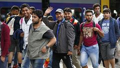 Uprchlíci práv vystoupili z vlaku v Mnichov.