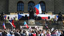 Skandovali hesla Čechy Čechům nebo Islám mimo zákon. Akci hlídali těžkooděnci. Skandovali hesla Čechy Čechům nebo Islám mimo zákon. Akci hlídali těžkooděnci.