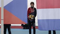 Martina Sablikova, of Czech Republic, listens to the national anthem after... | na serveru Lidovky.cz | aktuální zprávy