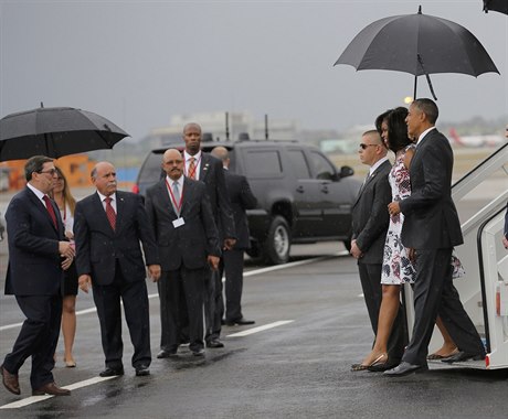 Prezident Obama s chotí jde vstíc kubánské delegaci
