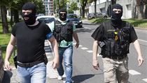Na snímku policisté, kteří zasahovali v domě u Ivo Rittiga. | na serveru Lidovky.cz | aktuální zprávy