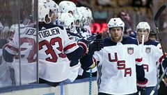 Team USA's Joe Pavelski celebrates his goal with teammates against Team Czech...