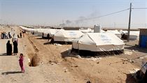 Uprchlci z vlen zny msta Mosul. V tboe jsou eny i dti. OSN odhaduje,...