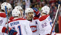 Tomas Plekanec is celebrated by his teammates.