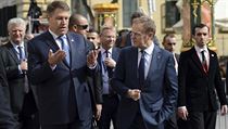 Romanian President Klaus Werner Iohannis, center left, speaks with European Council President Donald Tusk
