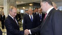 Vladimir Putin (vlevo) a Petro Porošenko při jednáních v Minsku (2014). | na serveru Lidovky.cz | aktuální zprávy