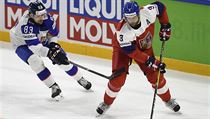 Zleva Martin Bakoš ze Slovenska a Radko Gudas z Česka. Momentka z utkání... | na serveru Lidovky.cz | aktuální zprávy