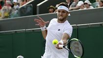 Jiří Veselý v zápase Wimbledonu 2018 proti Fabiu Fogninimu. | na serveru Lidovky.cz | aktuální zprávy