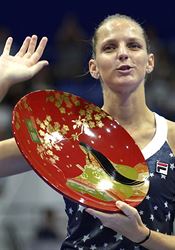 Když přijede táta na můj zápas, mám klid na svůj tenis, překvapuje Plíšková Je to tam. Karolína Plíšková zdraví do hlediště svého otce Radka. | na serveru Lidovky.cz | aktuální zprávy