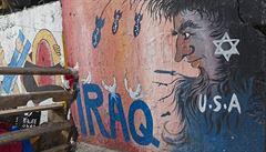 Nevítaní hosté. Graffiti v Bagdádu karikuje roli USA v regionu.