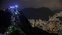Osvoboďte Hongkong, vyzývá nápis nad východoasijským městem. | na serveru Lidovky.cz | aktuální zprávy