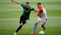 Michal Jeřábek v souboji se Stanislavem Teclem. | na serveru Lidovky.cz | aktuální zprávy