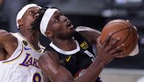 Basketbalista Denver Nuggets Jerami Grant (9) se snaží vystřelit na koš. | na serveru Lidovky.cz | aktuální zprávy