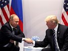 Ruský prezident Vladimir Putin na první schůzce se svým americkým protějškem...