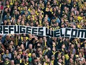 V Dortmundu vítali fanouci uprchlíky.