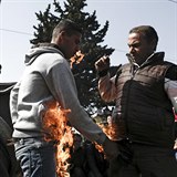 Na protest proti uzavenm hranicm se v eckm uprchlickm tboe Idomeni...