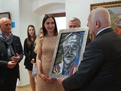 Za svj píspved do debaty obdrel Václav Klaus darem portrét lovka, kterého...
