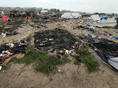 ást tábora zapálili rozzuení uprchlíci, zbytek srovnaly se zemí stavební...