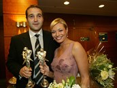 Pavel Zuna s Lucií Borhyovou v roce 2004