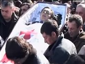 Kumaritaviliho v Gruzii pohbili jako národního hrdinu.