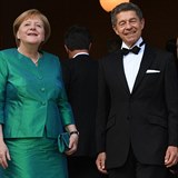 Angela Merkelov s manelem Joachimem Sauerem.