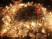 Pieta za mrtvé leny redakce Charlie Hebdo.