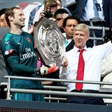 S trenrem Wengerem, kter si ho v roce 2015 pivedl do Arsenalu.