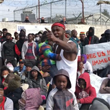 Protestujc migrant seval Evropu.