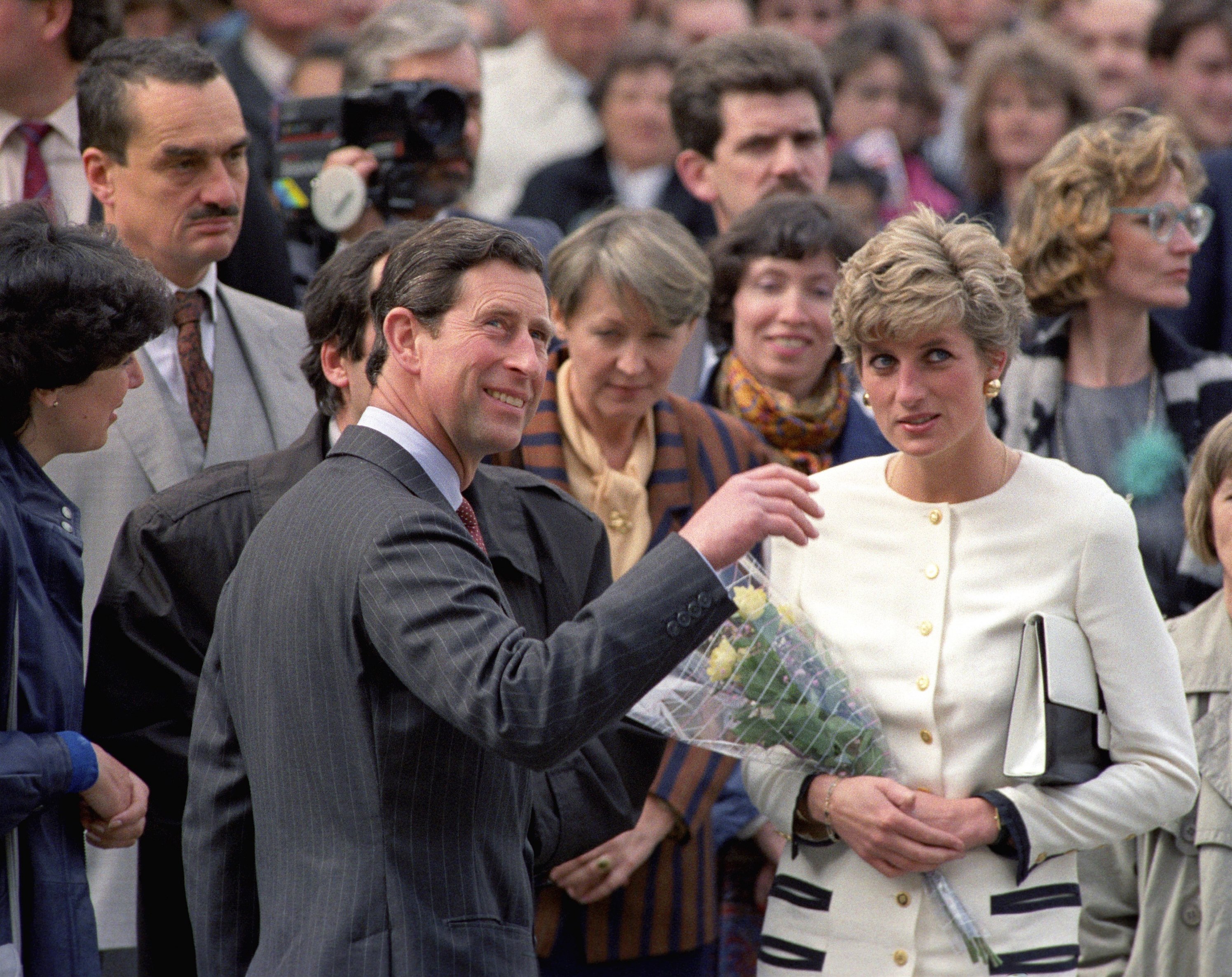 Prince Charles with Princess Diana in Prague.  Behind them is vid