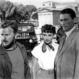 Gregory Peck, Audrey Hpburn a Eddie Albert ve filmu Przdniny v m.