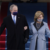 Bval prezident George W. Bush a jeho ena Laura pichzej na 59. prezidentskou inauguraci.