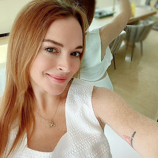 astná hereka Lindsay Lohan.