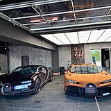 Richarda Chlada a Andrewa Tatea spojily jejich sporťáky Bugatti Chiron.