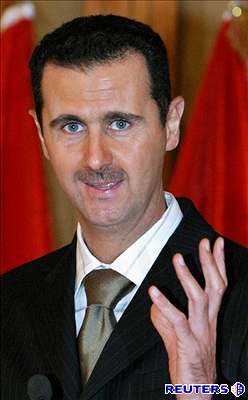 Syrský prezident Baár Asad bhem televizního projevu