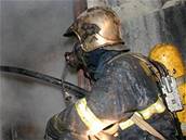 Hasi� p�i po�áru bytu