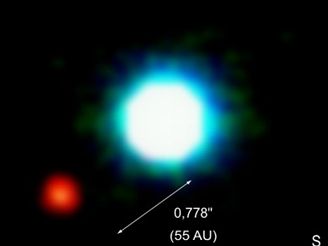 První přímý snímek exoplanety (2M1207)