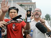 Jeden ze t�í k�es�anských aktivist�, kte�í byli zadr�eni v Pekingu