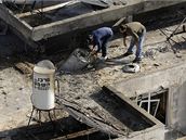 Izraelský dm po dopadu raket vypálených z pásma Gazy na msto Adod 3. leden 2008)