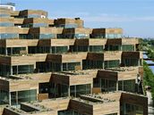 Bytový d�m Mountain Dwellings p�ipomíná ob�í mraveni�t�, proh�ívané ji�ním sluncem.