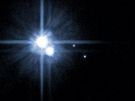 Hubblv teleskop: Pluto, Cháron a dalí dva malé msíce