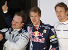 Sebastian Vettel, Rubens Barrichello (vlevo) a Jenson Button.