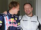 Sebastian Vettel (vlevo) a Rubens Barrichello, první a druhé místo po kvalifikaci na Velkou cenu Velké Británie