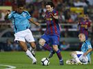 Barcelona - Almeira: Lionel Messi (urposted), Hernan Bernardello(vpravo) a Hernan Pellerano 