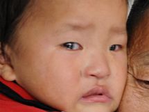 Wan Pan-ching se po dvou letech setkal se svm synem (2. 11. 2009)