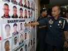 éf filipínské policie ukazuje snímky podezelých z masakru v provincii Maguindanao