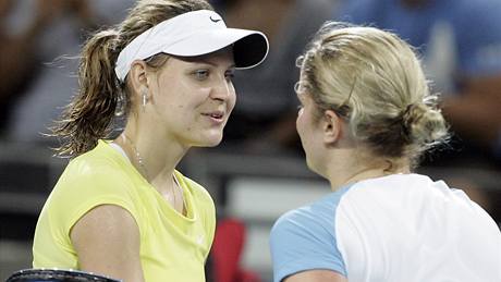 Lucie �afá�ová a Kim Clijstersová